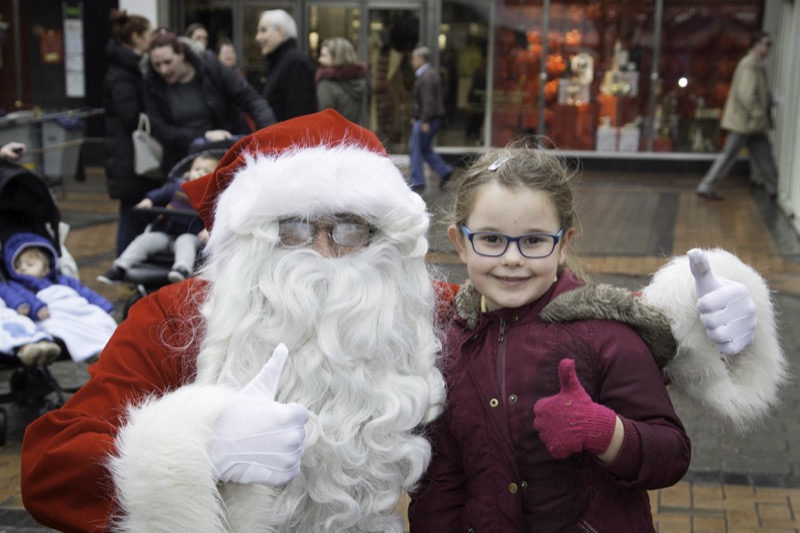 SANTA ARRIVES AT THE PYRAMIDS SHOPPING CENTRE, BIRKENHEAD.... Pictured is Santa with Zoe Ockenden,6 from Upton .